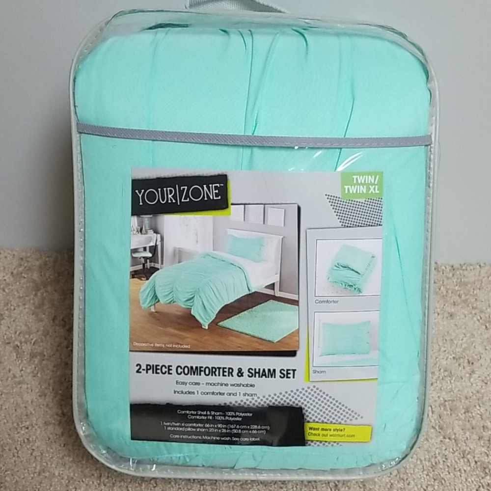 Twin comforter and 2 shams.